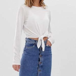 Women’s white long sleeve top with a front tie